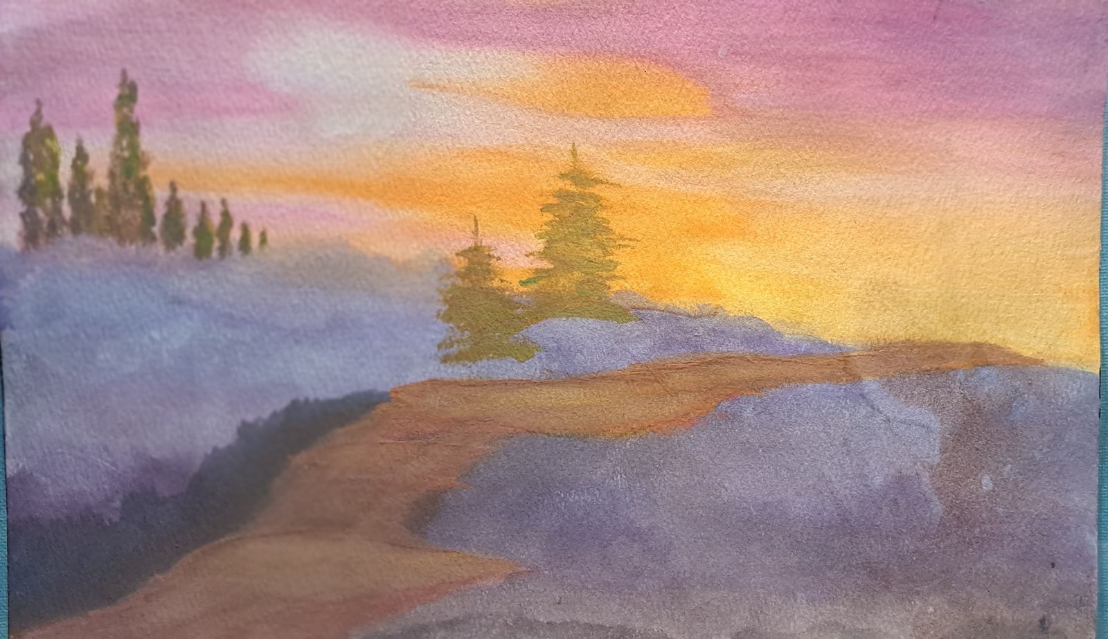Watercolor painting of pine trees on a ridge at pink and gold sunset